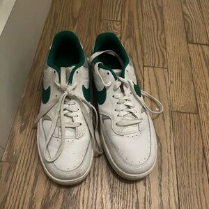 Nike White Low-Top Sneakers with Green Swoosh